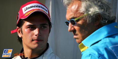 Nelson Piquet Jr. with Flavio Briatore